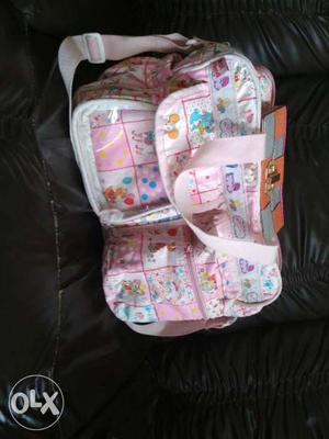 Pink, White, And Blue Print Diaper Bag