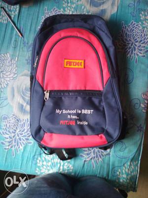 Purple And Red Fitjee Backpack