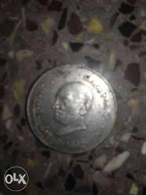 Round Silver Coin With Mans Face