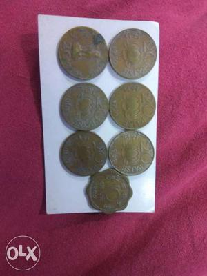 Seven Brown Indian Coins