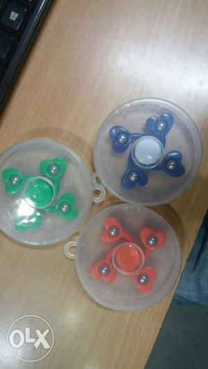 Three Blue,green And Red Hand Spinners
