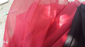 Tissue organza fabric at 25Rs a meter. Cherry pink and black