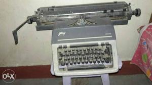 White And Gray Typewriter
