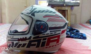 White, Red, And Black FliR Motorcycle Helmet