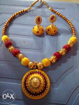 Yellow And Red Necklace With Pair Of Yellow-and-red Jhumkas