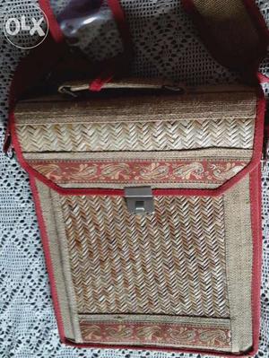 A very attractive jute bag with number lock, It is unused.