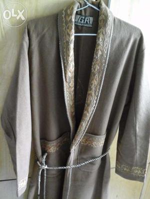 Almost new woolen housecoat in a good condition.Its colour