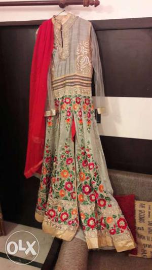 Brand new designer gown with pants front open