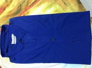 Calvin Klein sharp blue shirt. Original price Rs.