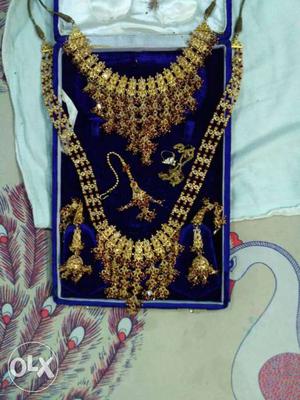Diamond Embellished Gold Layered Necklace And Earrings