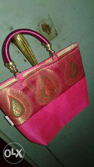 Fancy compact designer bag to carry with ethnic