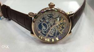 Gold Round Skeleton Watch With Brown Leather Strap
