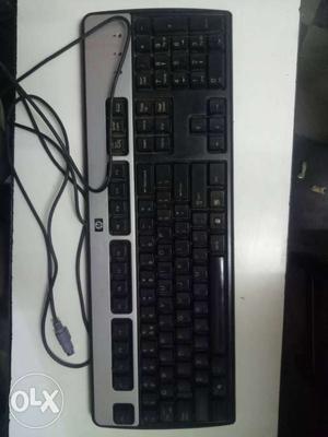 Gray And Black Hewlett Packard Corded Keyboard