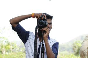I want to DSLR camera. my budget /-