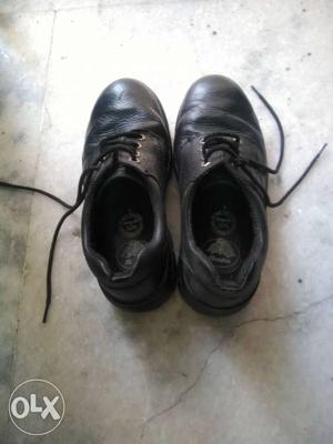 Less used, good condition, black safety shoe of
