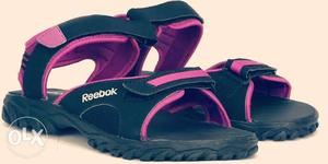Pair Of Black And Purple Reebok Sandals