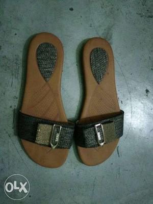 Pair Of Brown-and-black Sandals