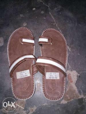 Pair Of Brown-and-white Leather Flat Sandals