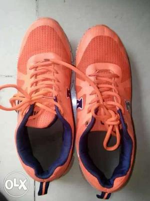 Pair Of Orange-and-white Nike Air Sneakers
