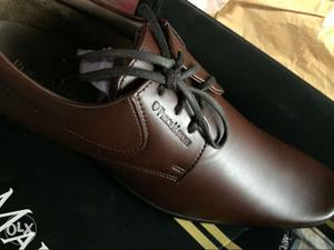 Pair of Brown leather Shoes: M&O