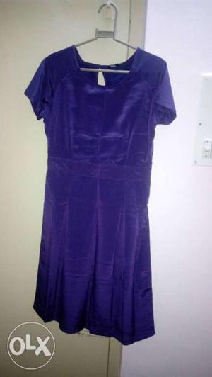 Polyester one piece dress. Dry cleaned and worn