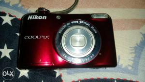 Red And Black Nikon Point And Shoot Camera