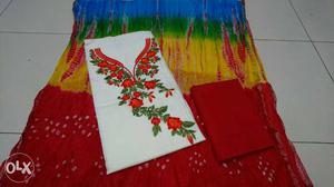 Red, Yellow, And Green Floral Textile