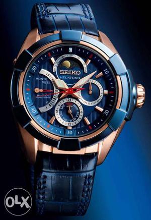 Round Black And Gold Seiko Chronograph Watch With Black