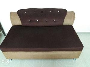2 Dark and light brown couch