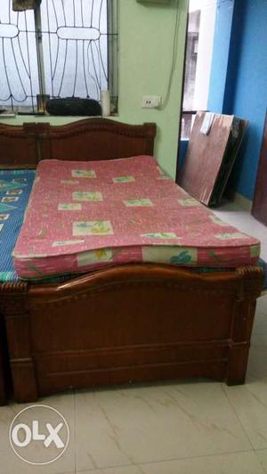 2 single folding wooden bed. Size-6x3 with