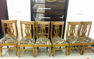 6 Brown Wooden Chairs...due to transfer selling this