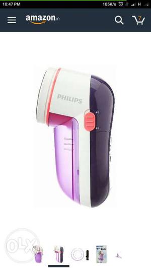 Black And Purple Philips Electric Shaver