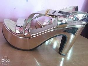 Golden wedge heels..only one time used sandal... nd 4 5