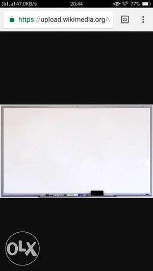 Its awhite board can be used at school or