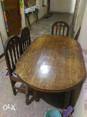Oblong Brown Wooden Table With Three Chair Set
