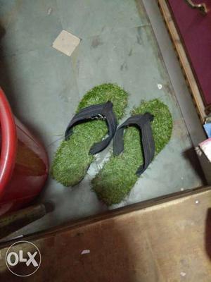 Pair Of Green-and-gray Flip Flops