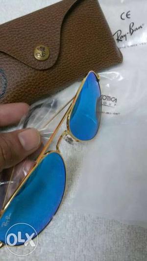 Ray Ban unused blue reflector with golden