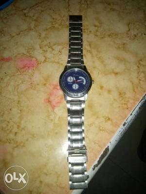 Round Blue Chronograph Watch With Silver Linked Strap