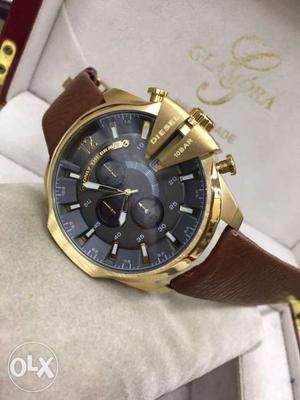 Round Gold And Gray Chronograph Watch With Brown Leather