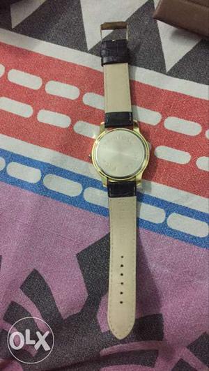 Round Gold Watch With Brown Leather Band