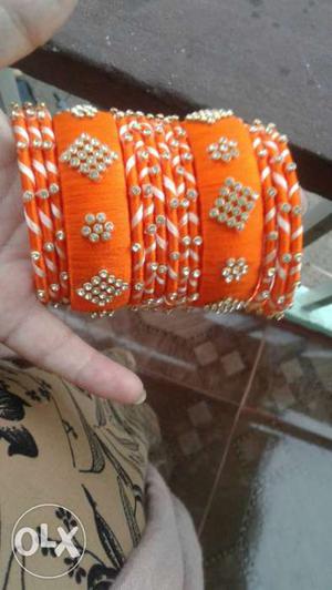 Set of Orange and cream colour silk thread bangles with