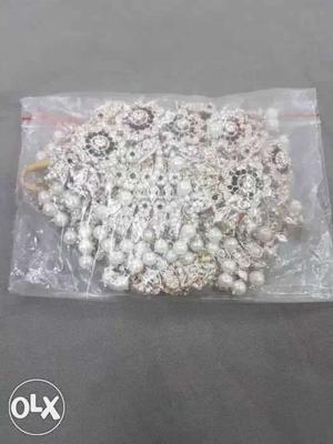 Silver And Pearl Accessory In Zip Lock Pack