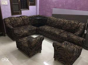 Sofa set with 1 corner set and 2 puffies any one