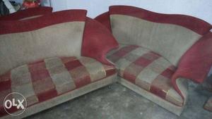 Two Purple And Gray Plaid Sofa's