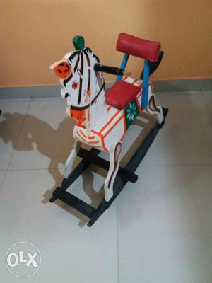 White And Black Wooden Rocking Horse