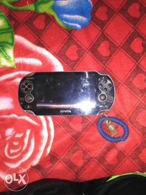 1½yr old Psvita. With Charger and Games. Price