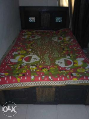 A single bed with box