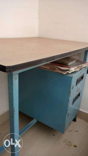 A steel wooden table in a good condition