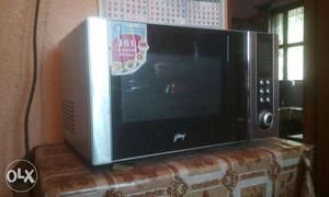 Black And Gray Microwave Oven