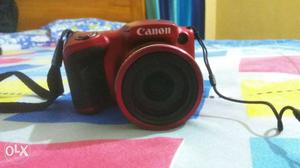 Black And Red Canon Camera Sx400is with 16 mega pixel and